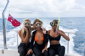 Women on deck enjoying the tour